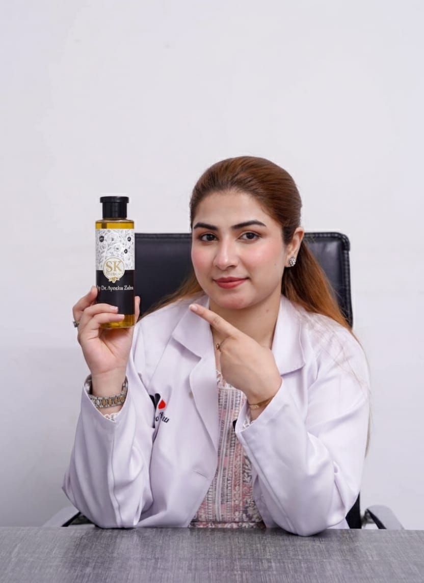 Sk Oil by Dr. Ayesha Zahra, a clear glass bottle containing nourishing skincare oil with a black cap and label.