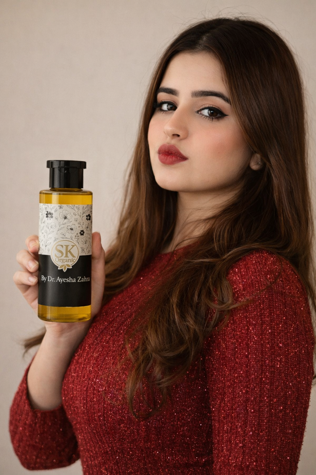 Sk SK Oil by Dr. Ayesha Zahra, a bottle of nourishing skincare oil with a sleek design and clear labeling.